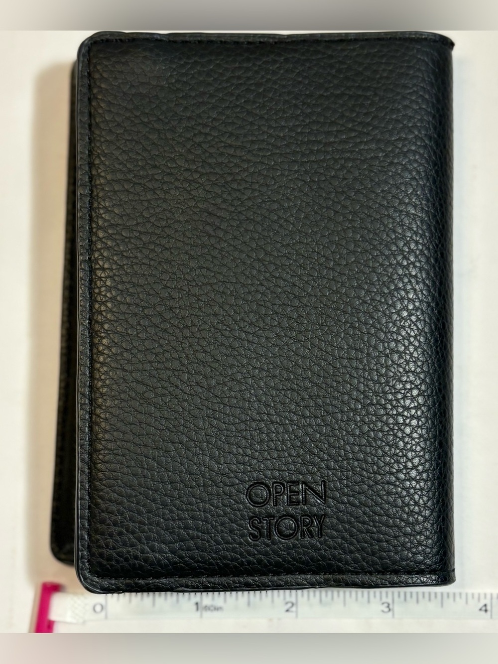 Open Story black pebble leather passport holder or travel wallet